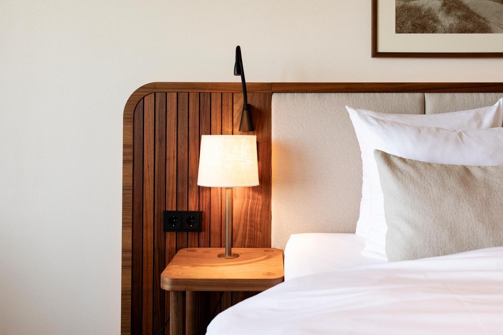 Grand Hotel Huis Ter Duin ノールトウェイク 部屋 写真 A wall-mounted light