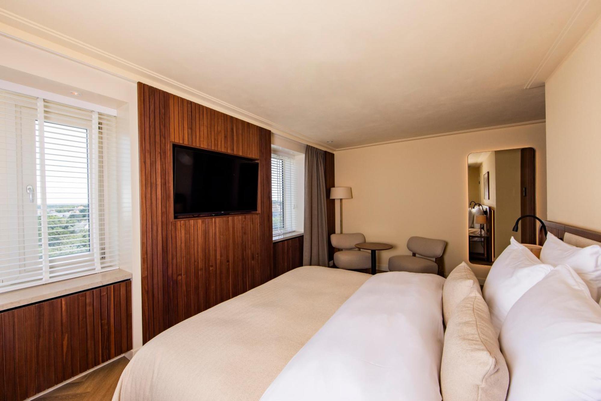 Grand Hotel Huis Ter Duin ノールトウェイク 部屋 写真 A bedroom at the hotel