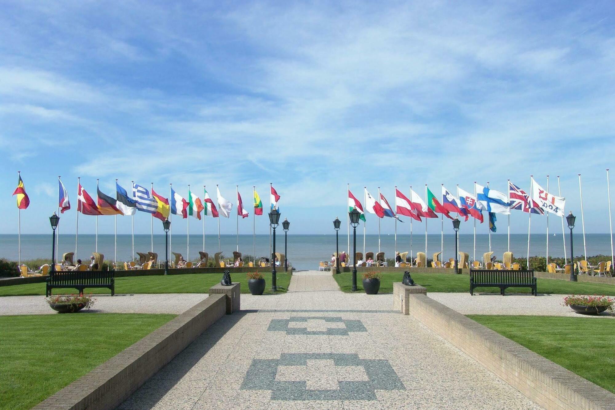 Grand Hotel Huis Ter Duin ノールトウェイク エクステリア 写真 Flags of the 29 NATO countries at the NATO memorial in Bruges, Belgium